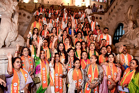 Newly elected corporators of the Shiv Sena (Shinde faction) and the BJP gather at the BMC headquarters before departing for group registration at Konkan Bhavan, in Mumbai.