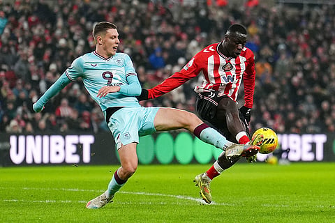 Burnley's Maxime Esteve, left, and Sunderland's Brian Brobbey battle for the ball during the Premier League match at the Stadium of Light in Sunderland.