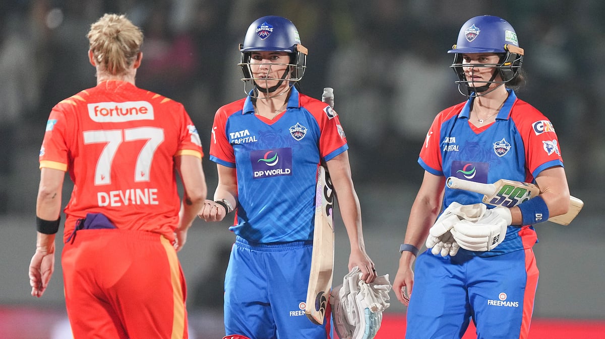 PTI : Marizanne Kapp (centre) and Laura Wolvaardt (right) interact with Sophie Devine after Delhi Capitals' win against Gujarat Giants in the Women's Premier League 2026 Eliminator in Vadodara.