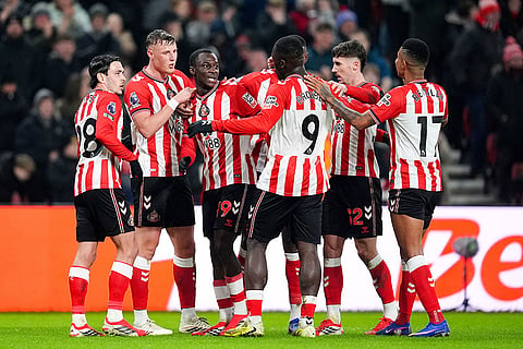 Sunderland's Habib Diarra, center, celebrates with teammates after scoring his team's second goal against Burnley at a Premier League soccer match against in Sunderland.