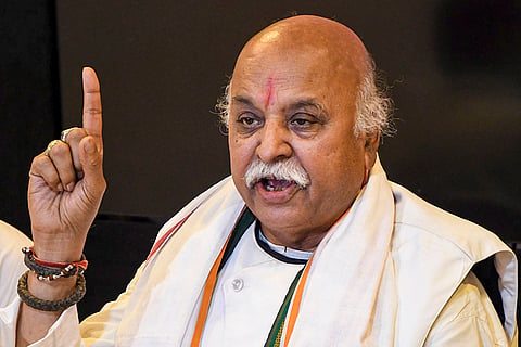 Rashtriya Bajrang Dal’s National President Pravin Togadia addresses a press conference, in Guwahati.
