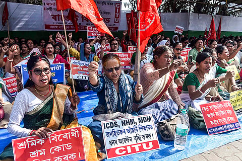 Members of the 'Asom Rajyik Anganwadi Karmi' stage a protest against the Union Budget, at Chachal in Guwahati.