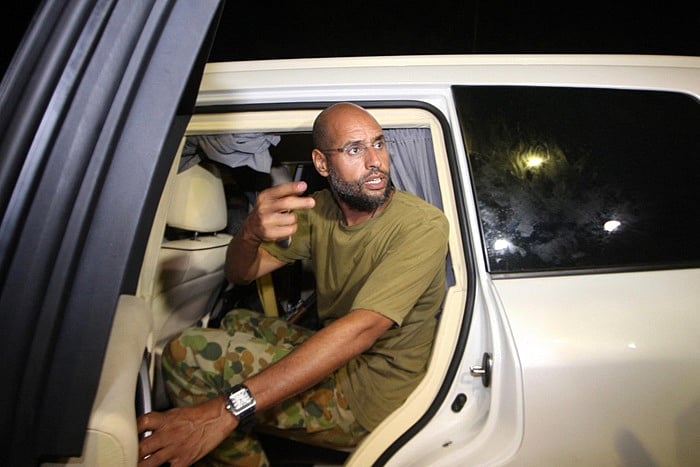 File photo : The Saudi-owned al-Arabiya television channel reported that Seif al-Islam was shot dead in the garden of his residence, citing sources close to the Gadhafi family.

