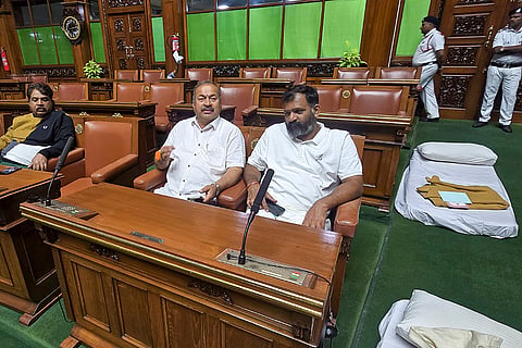 Opposition BJP and JD(S) MLAs during an overnight protest demanding Excise Minister R B Timmapur's resignation inside the Karnataka Assembly premises, in Bengaluru.