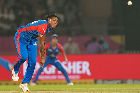 Delhi Capitals' Chinelle Henry bowls during the Women's Premier League (WPL) 2026 eliminator T20 cricket match between Gujarat Giants and Delhi Capitals, in Vadodara, Gujarat.
