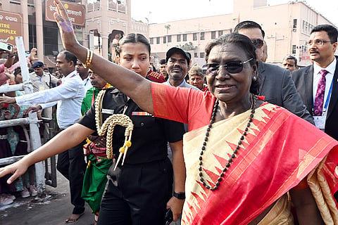 President Droupadi Murmu waves to the gathering during her visit to the Jagannath Temple, Puri. 
