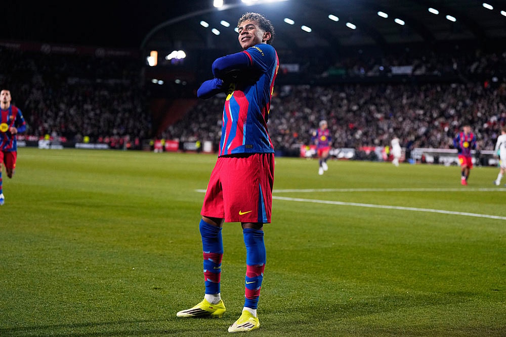 | Photo: AP/Manu Fernandez : Barcelona's Lamine Yamal celebrates the opening goal during a Copa del Rey quarterfinal soccer match between Albacete and Barcelona, in Albacete, Spain.