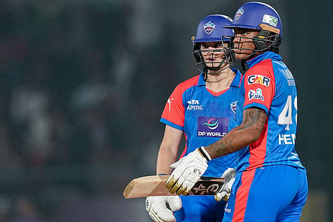 Delhi Capitals' Chinelle Henry, right, and Laura Wolvaardt during the Women's Premier League (WPL) 2026 final T20 cricket match between Delhi Capitals and Royal Challengers Bengaluru, at Baroda Cricket Association Stadium, Kotambi in Vadodara, Gujarat.