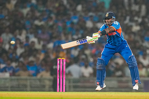 India's captain Suryakumar Yadav plays a shot during the ICC Men's T20 World Cup warm-up cricket match between India and South Africa, at the DY Patil Sports Academy, in Navi Mumbai.