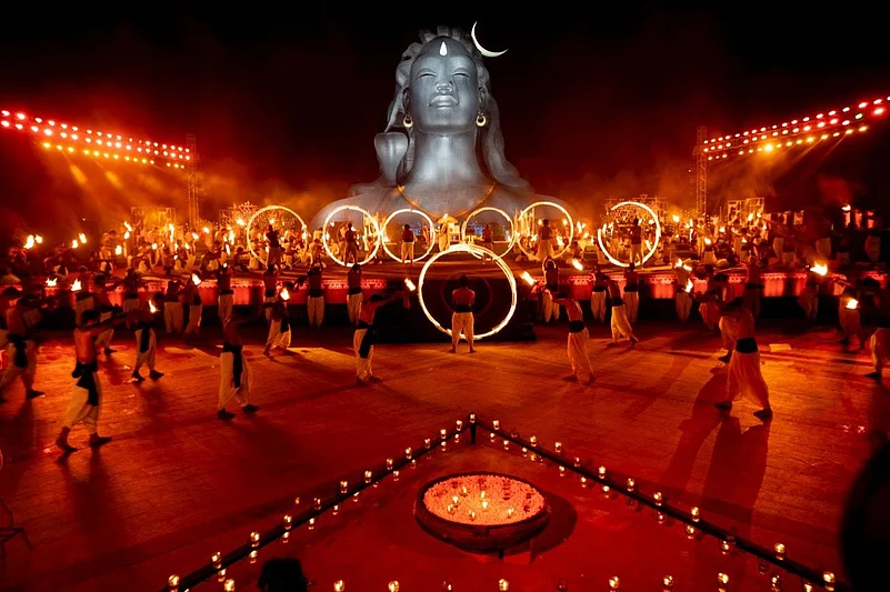 112-foot Adiyogi Shiva statue illuminated during a 3D laser light show at Isha Yoga Center.