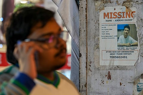 A man speaks on phone near a poster of a missing person put up on a wall, in New Delhi. In the first 15 days of 2026, more than 800 people were reported missing in Delhi, with women and girls accounting for nearly two-thirds of the cases, according to official data from Delhi Police. 