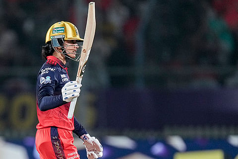 Royal Challengers Bengaluru's captain Smriti Mandhana celebrates her half century during the Women's Premier League (WPL) 2026 final T20 cricket match between Delhi Capitals and Royal Challengers Bengaluru, at Baroda Cricket Association Stadium, Kotambi in Vadodara, Gujarat.