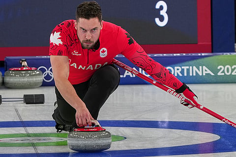 Canada's Brett Gallant in action during the mixed doubles round robin phase of the curling competition against the Czech Republic at the 2026 Winter Olympics, in Cortina d'Ampezzo, Italy.