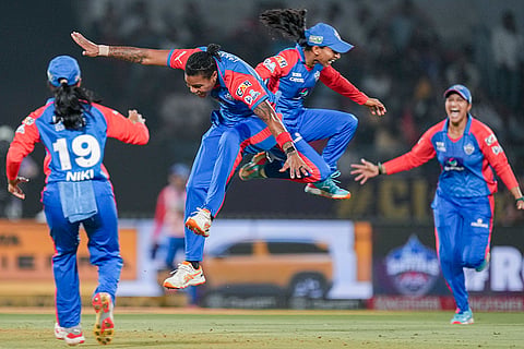 Delhi Capitals' Chinelle Henry with teammates celebrates after taking the wicket of Royal Challengers Bengaluru's Grace Harris during the Women's Premier League (WPL) 2026 final T20 cricket match between Delhi Capitals and Royal Challengers Bengaluru, at Baroda Cricket Association Stadium, Kotambi in Vadodara, Gujarat.
