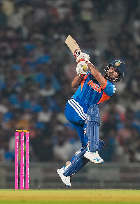 India's Ishan Kishan plays a shot during the ICC Men's T20 World Cup warm-up cricket match between India and South Africa, at the DY Patil Sports Academy, in Navi Mumbai.