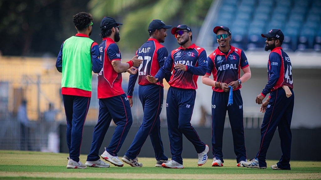 | Photo: X/CricketNep : Nepal players in action during the ICC T20 World Cup warm-up match agaisnt Canada on February 5, 2026.