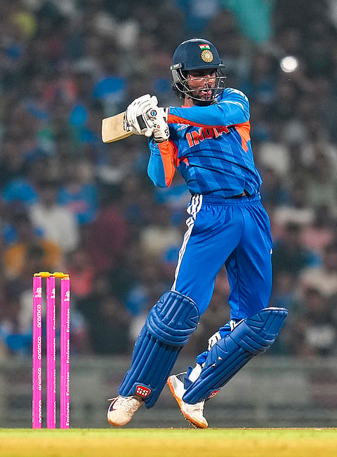 India's Tilak Varma plays a shot during the ICC Men's T20 World Cup warm-up cricket match between India and South Africa, at the DY Patil Sports Academy, in Navi Mumbai.