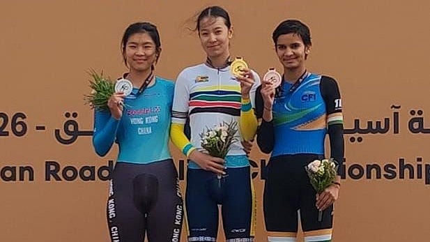 Special Arrangement : Anjali Jakhar (right) stands on the podium with her bronze medal at the Asian Road Cycling Championships in Qassim, Saudi Arabia.