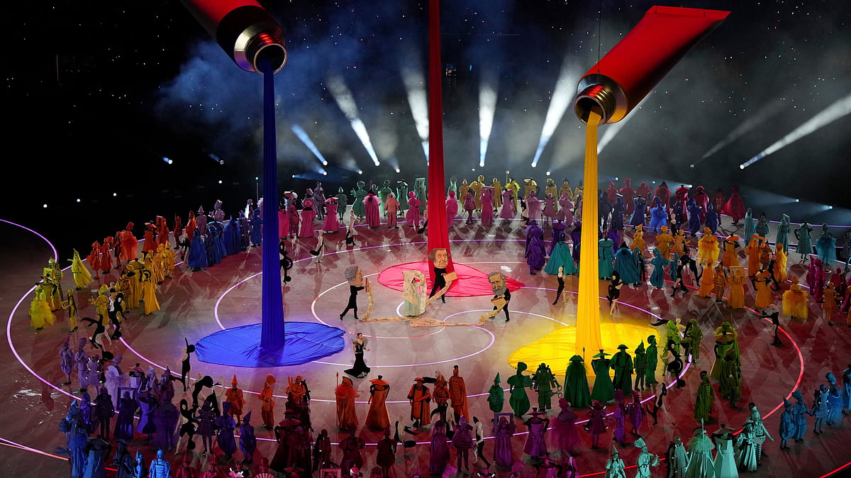 (AP Photo/Francisco Seco) : Dancers perform during the Olympic opening ceremony at the 2026 Winter Olympics, in Milan, Italy, Friday, Feb. 6, 2026. 