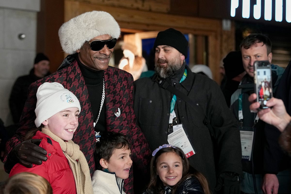 Rapper Snoop Dogg poses for a photo prior to the Olympic opening ceremony at the 2026 Winter Olympics, in Cortina d'Ampezzo, Italy, Friday, Feb. 6, 2026.