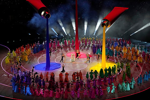 Dancers perform during the Olympic opening ceremony at the 2026 Winter Olympics, in Milan, Italy, Friday, Feb. 6, 2026.