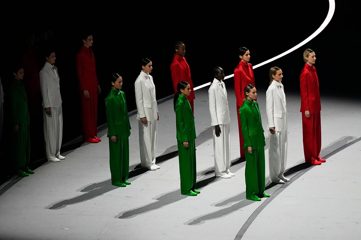 Artists perform during the Olympic opening ceremony at the 2026 Winter Olympics, in Milan, Italy, Friday, Feb. 6, 2026.