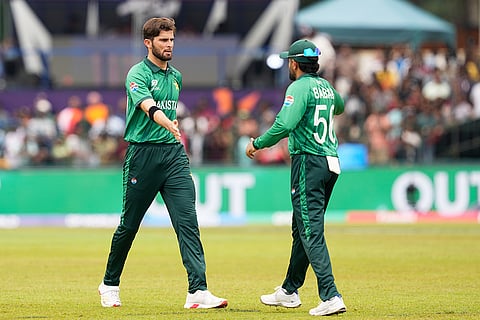 Pakistan's Shaheen Shah Afridi, left. celebrates with teammate Babar Azam the wicket of Netherlands' Roelof van der Merwe during the T20 World Cup cricket match between Netherlands and Pakistan in Colombo, Sri Lanka.