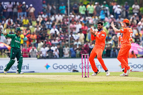 Netherlands' Aryan Dutt, second right, celebrates after dismissing Pakistan's Saim Ayub, left, during the T20 World Cup cricket match between Netherlands and Pakistan in Colombo, Sri Lanka.