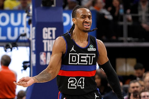 Detroit Pistons guard Daniss Jenkins (24) celebrates after scoring against the New York Knicks during the second half of an NBA basketball game in Detroit.