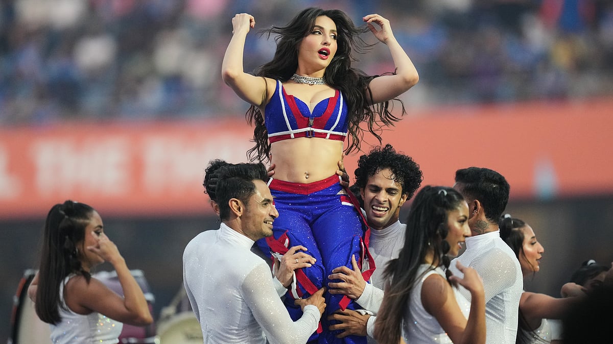 (AP Photo/Rafiq Maqbool) : Nora Fatehi performs during the opening ceremony before the T20 World Cup cricket match between India and the United States in Mumbai, India, Saturday, Feb. 7, 2026