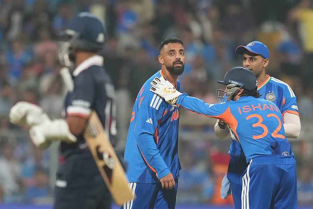 India vs USA  T20 World Cup cricket photos-Varun Chakravarthy