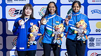 Star Bollywood Actor Sponsors Rifle For Meghana Sajjanar After Learning About Her Struggle X/NRAI : India's Meghana Sajjanar (right) and Elavenil Valarivan (centre) on the podium after bagging bronze and gold medals at the Asian Championship 2026's women’s 10m air rifle event.