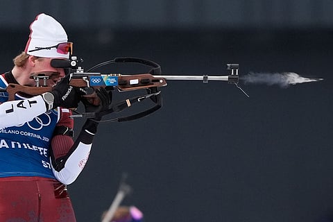 Renars Birkentals, of Latvia, participates in a biathlon training session at the 2026 Winter Olympics in Anterselva, Italy.