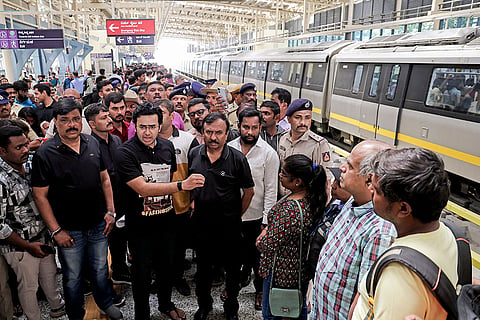 BJP MP Tejasvi Surya interacts with commuters at RV Road Metro Station over concerns regarding the proposed Bengaluru Metro fare revision, in Bengaluru, Karnataka.