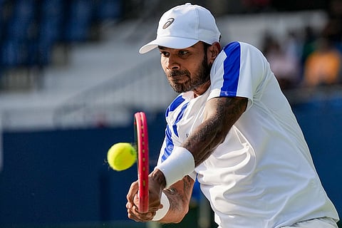 India's Sumit Nagal competes against Netherlands' Guy Den Ouden, unseen, during the 2026 Davis Cup Qualifiers first round tie, in Bengaluru, Karnataka.
