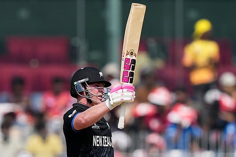 New Zealand's Tim Seifert celebrates his fifty runs during the T20 World Cup cricket match between Afghanistan and New Zealand in Chennai, India.
