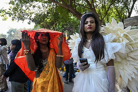 Members of the LGBTQ+ community participate in the Delhi Queer Pride at Jantar Mantar, in New Delhi.