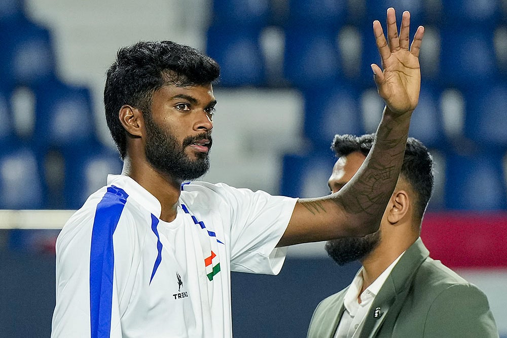 | Photo: PTI/Shailendra Bhojak : India's Dhakshineswar Suresh celebrates his victory in the second singles match of the 2026 Davis Cup Qualifiers first round tie against Netherlands' Jesper De Jong, unseen, at SM Krishna Tennis Stadium, in Bengaluru, Karnataka.