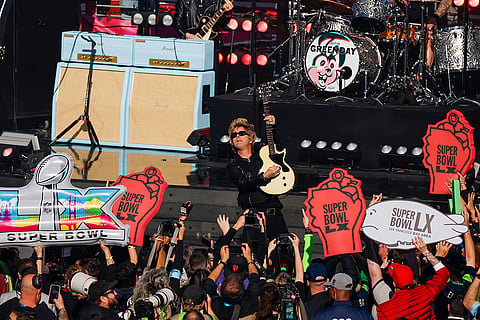 Green Day performs during the pregame at Super Bowl LX between the Seattle Seahawks and New England Patriots in Santa Clara, California.