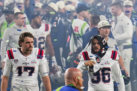 New England Patriots punter Bryce Baringer (17) and place-kicker Andy Borregales (36) walk off the field after losing to the Seattle Seahawks in the NFL Super Bowl 60 football game in Santa Clara, California.