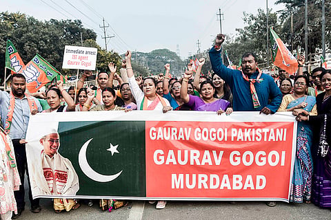 BJP members shout slogans during a protest against Assam Pradesh Congress Committee president Gaurav Gogoi over alleged links to Pakistan, in Guwahati.