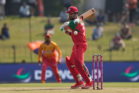 Oman's Sufyan Mehmood plays a shot during the T20 World Cup cricket match between Oman and Zimbabwe in Colombo, Sri Lanka.