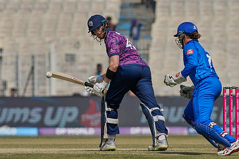 Scotland's Michael Jones plays a shot during the T20 World Cup cricket match between Italy and Scotland in Kolkata.