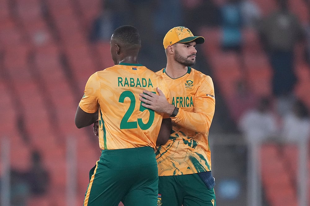 | Photo: AP/Ajit Solanki : South Africa's captain Aiden Markram, right, and South Africa's Kagiso Rabada after wining against Canada during the T20 World Cup cricket match in Ahmedabad.