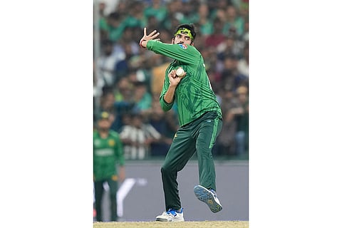Pakistan's Usman Tariq bowls a delivery during the T20 World Cup cricket match between Pakistan and the United States in Colombo, Sri Lanka.