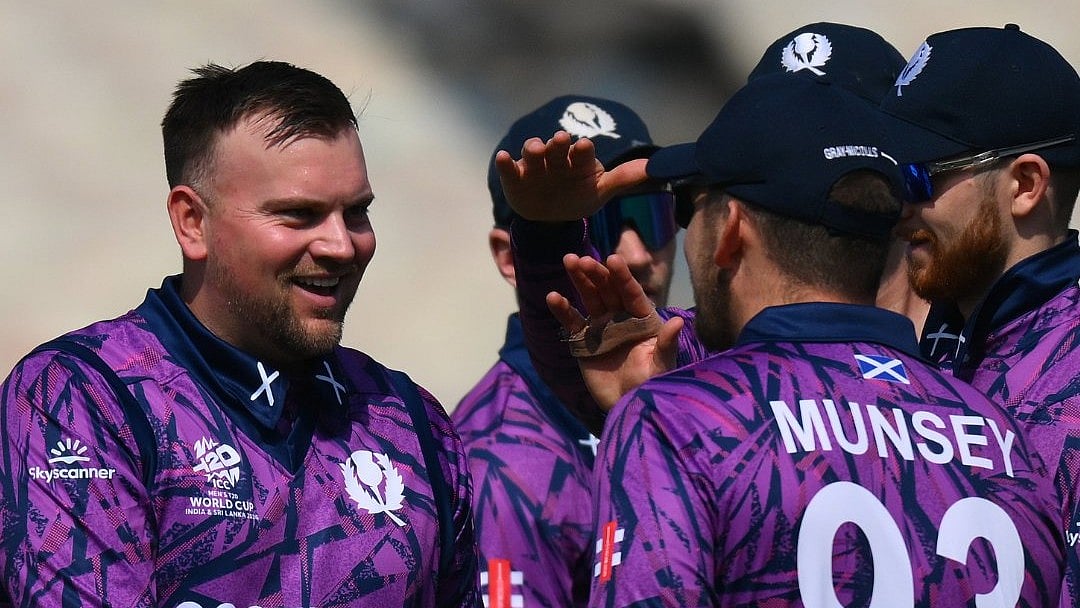 X/CricketScotland : Scotland players celebrate a fall of wicket against Italy