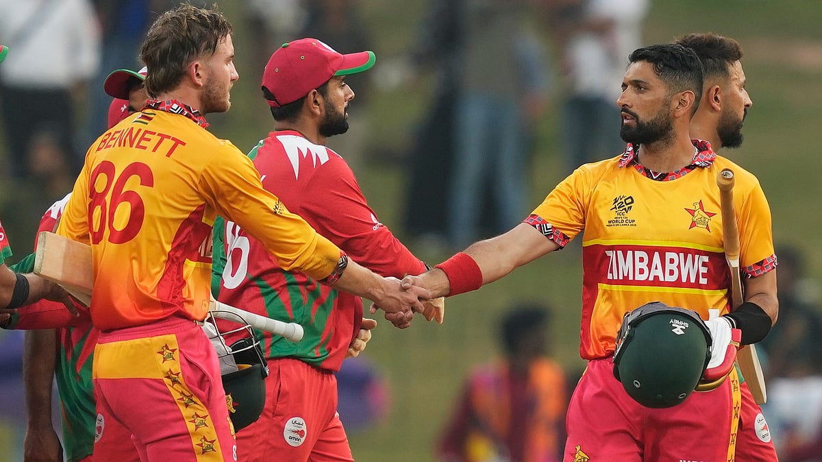 | Photo: AP/Eranga Jayawardena : Zimbabwe's captain Sikandar Raza, right, Brian Bennett, left, celebrate after winning their T20 World Cup cricket match against Oman in Colombo, Sri Lanka, Monday, Feb. 9, 2026. 