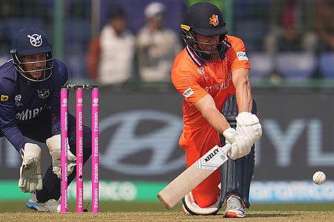 Netherlands' Colin Ackermann plays a shot during the T20 World Cup cricket match between Namibia and Netherlands in New Delhi.