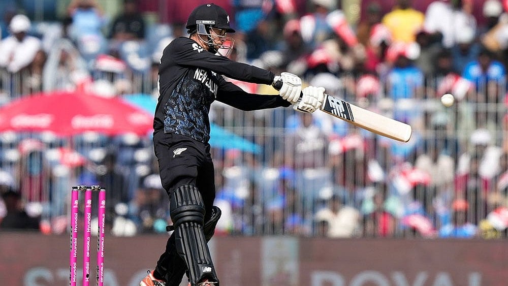 | Photo; AP/Mahesh Kumar A. : New Zealand's captain Mitchel Santner bats during the T20 World Cup cricket match between Afghanistan and New Zealand in Chennai, India.