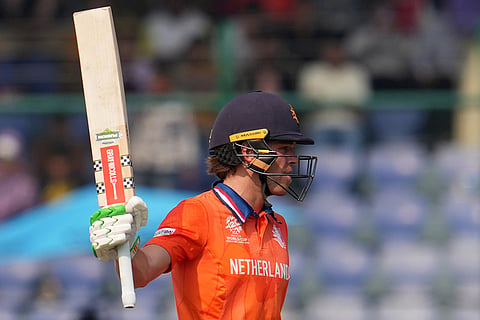 Netherlands' Bas de Leede celebrates after scoring fifty runs during the T20 World Cup cricket match between Namibia and Netherlands in New Delhi.